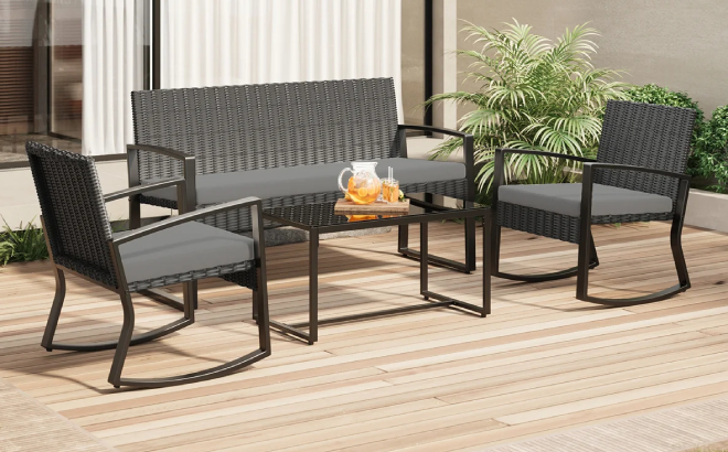 4-person wicker patio set on a patio, sold by The Store