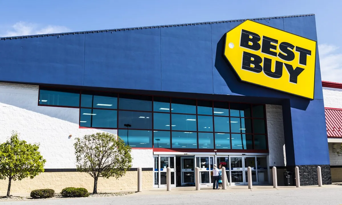 Best Buy store displaying laptops and home appliances on sale