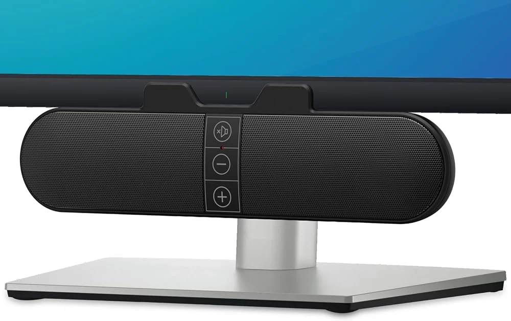 Computer soundbar speakers with USB plug, clipped to a desktop monitor, sold on Amazon